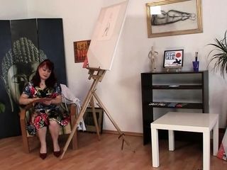 Mature paintress gets naked and rides cock