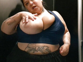 Showing off After Workout in the Gym Bathroom