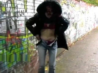 Public flashing of redhead milf Monica exposing tits and peeing outdoors