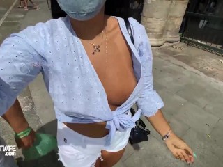 Showing off on the street in a baggy blouse, leaving my big delicious breasts on display