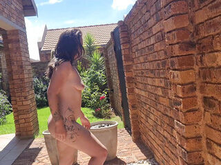 Sexy babe doing nude outdoor yoga
