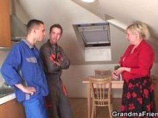 Two repairmen fuck old grandma from both ends