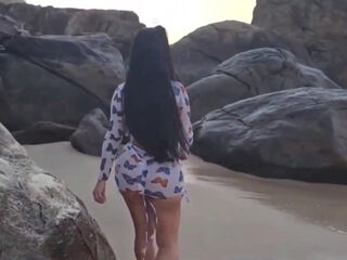 Hot brunette with nice big tits has a good pounding on the rocky seashore with her BBC friend