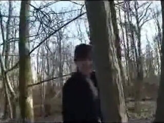 Brunette beautiful mature outdoor in the woods